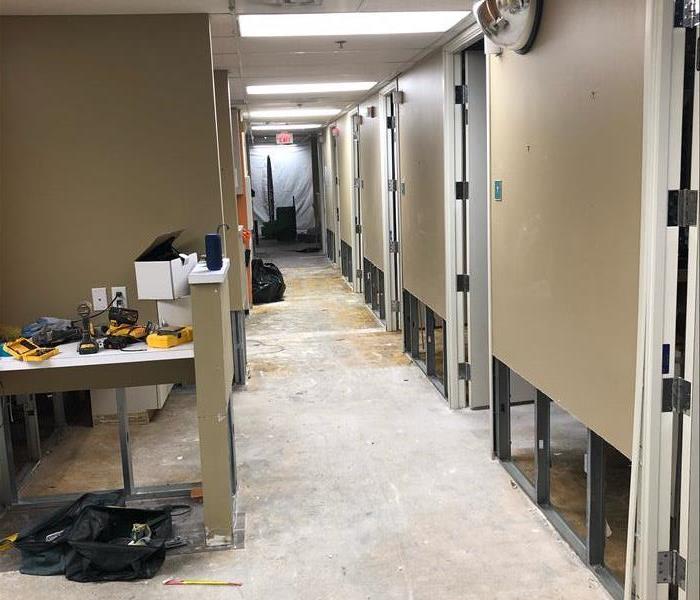 Removed flooring and flood cuts in business. 