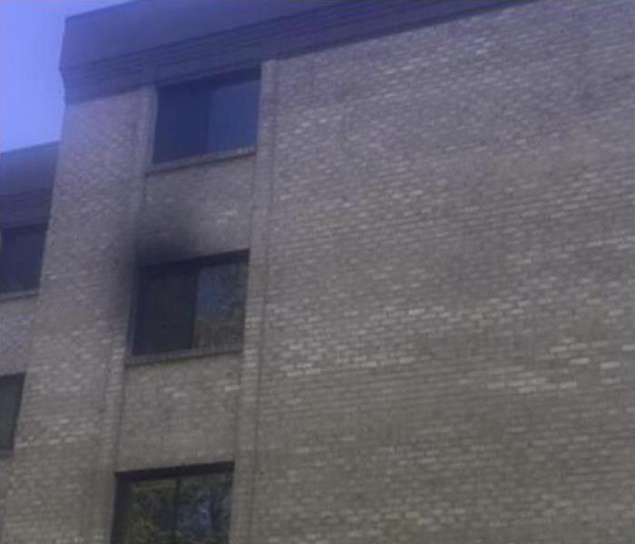 Three-story building, smoky window