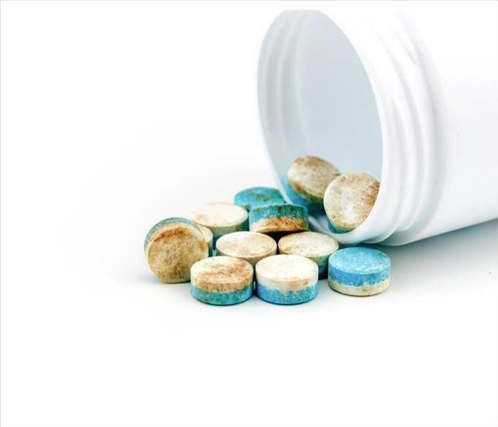 Blue & white pills medicine the drug expired.